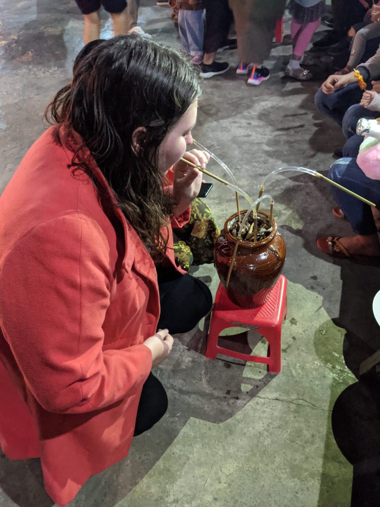 Photo of myself trying some of the traditional can wine