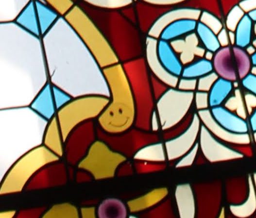 Photo of the secret smiley on the stained glass ceiling