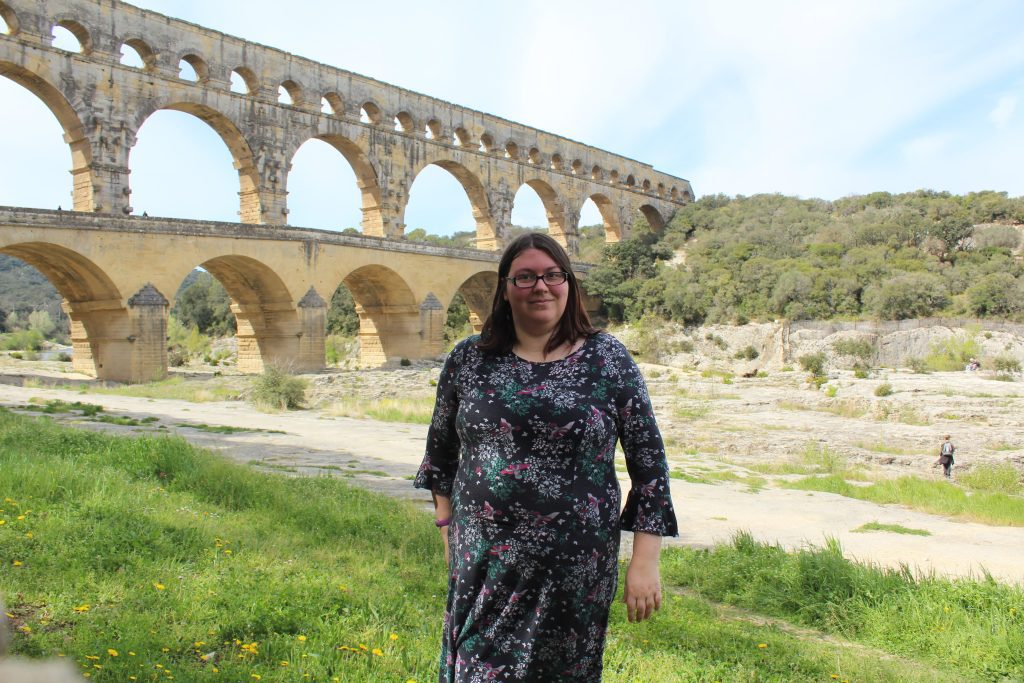 Photo of me standing in front of the Pont du Gard.
