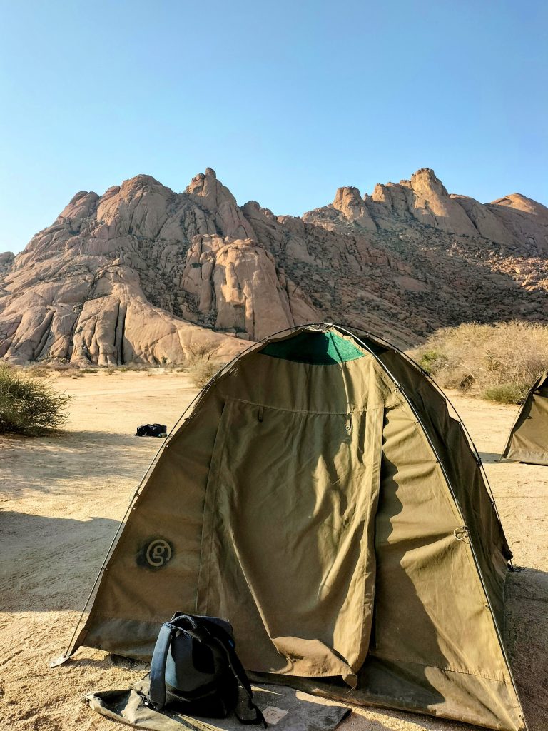 Photo of my tent with some of the Spitzkoppe peaks behind it.
