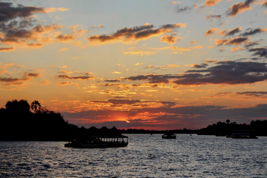 Photo of all the cruise ships gathering for the sunset on the Zambezi